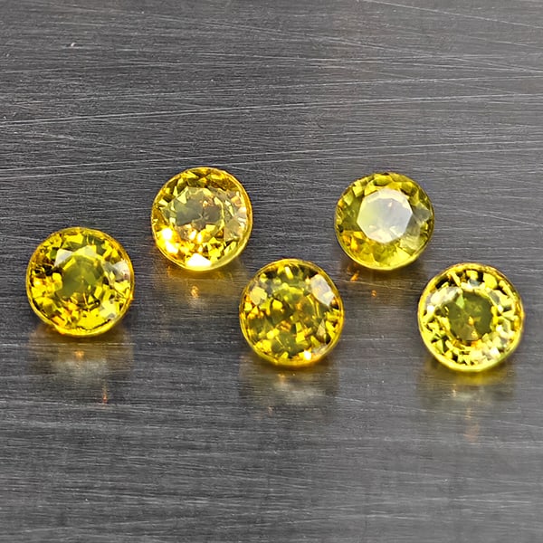 Natural Greenish Yellow Titanium Sphene Rainbow Spark 1.01 Ct. 5 Pcs Round Shape 3.3 Mm Gemstones: Product ID: 806509383 Product Name: Natural Sphene Weight: 1.01 CT. Size: 3.3 x 3.3 x 2.3 MM. Shape: Round Color: Greenish Yellow Clarity:SI1 Luster: Good Gems Origin: Madagascar Treatment: Unheated C