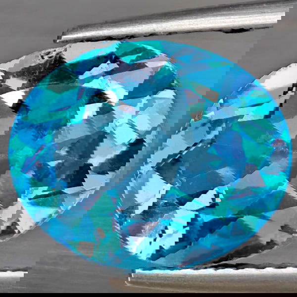 Natural Swiss Blue Topaz 4.45 Ct. Oval Shape 12.1 x 10 Mm Gemstone from Brazil: Product ID: 807169014 Product Name: Natural Blue Topaz Weight: 4.45 CT. Size: 12.1 x 10 x 5.4 MM. Shape: Oval Shape Color: Swiss Blue Clarity:VSI Luster: Good Gems Origin: Brazil Treatment: Treated Cr