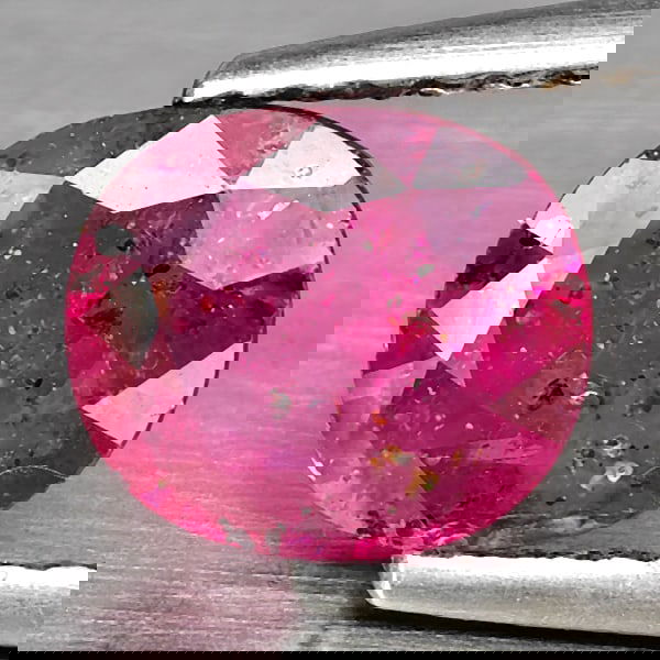 Natural Red Pink Ruby 1.39 Ct. Oval Shape 7.3 x 6.5 Mm Gemstone from Madagascar: Product ID: 105901470 Product Name: Natural Ruby Weight: 1.39 CT. Size: 7.3 X 6.5 X 3 MM. Shape: Oval Shape Color: Red Pink Clarity:SI1 Luster: Good Gems Origin: Madagascar Treatment: Heated (Lead-gla