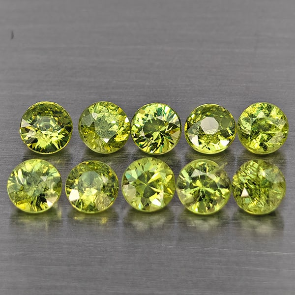 Natural Green Demantiod Garnet 2.29 Ct. 10 Pcs Round Diamond Cut 2.6 Mm Gemstones From Madagascar: Product ID: 802937691 Product Name: Natural Demantoid Weight: 2.29 CT. Size: 2.6 x 2.6 x 2.5 MM. Shape: Round Diamond Cut Color: Green Clarity:SI1 Luster: Good Gems Origin: Madagascar Treatment: Unhea