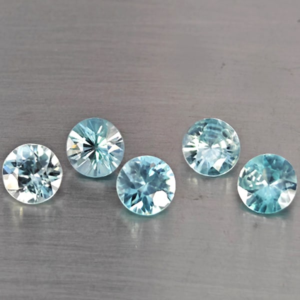 Natural Blue Zircon 3.97 Ct. 5 Pcs Round Diamond Cut Gemstone From Cambodia: Product ID: 807743241 Product Name: Natural Zircon Weight: 3.97 CT. Size: 5.5 x 5.5 x 3.3 to 5.3 x 5.3 x 3 MM. Shape: Round Diamond Cut Color: Blue Clarity:SI1 Luster: Good Gems Origin: Cambodia Treat
