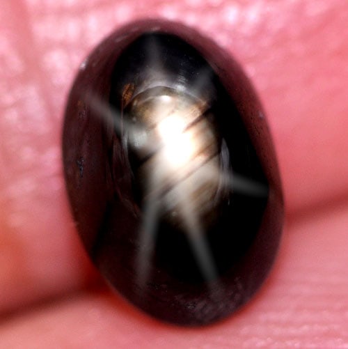 Natural Black Star Sapphire 3.22 Ct. Oval Cabochon Shape 9.1 x 6.2 Mm Gemstone from Thailand: Product ID: 806153924 Product Name: Natural Star Sapphire Weight: 3.22 CT. Size: 9.1 x 6.2 x 5.2 MM. Shape: Oval Cabochon Color: Black Clarity:Opaque Luster: Good 6 Rays Star Gems Origin: Thailand Tre