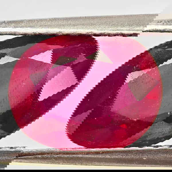 Natural Purplish Red Ruby 2.66 Ct. Oval Shape 9.1 x 7.1 Mm Gemstone From Madagascar: Product ID: 805935618 Product Name: Natural Ruby Weight: 2.66 CT. Size: 9.1 x 7.1 x 4.4 MM. Shape: Oval Color: Purplish Red Clarity:VSI Luster: Good Gems Origin: Madagascar Treatment: Heated (Lead-gla