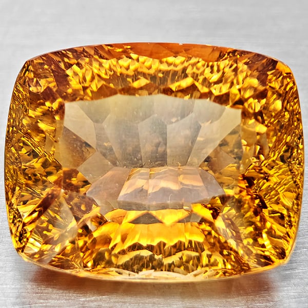 Natural Imperial Topaz 19.10 Ct. Cushion Concave Cut 16.6 x 13.3 Mm. Gemstone From Brazil: Product ID: 807168616 Product Name: Natural Topaz Weight: 19.10 CT. Size: 16.6 x 13.3 x 10.1 MM. Shape: Cushion Concave Cut Color: Imperial Clarity:VSI Luster: Very Good Gems Origin: Brazil Treatment: