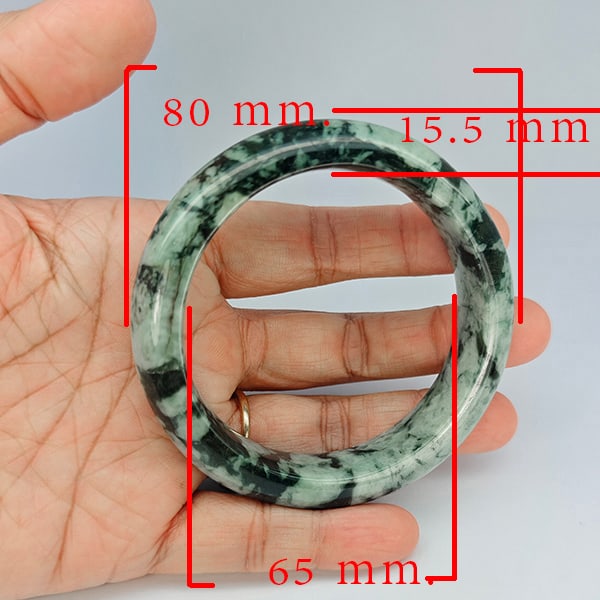 Natural Genuine Mulit Color Jade 447.18 Ct. Bangle Round Shape 80 x 65 Mm Gemstone from Thailand: Product ID: 819816089 Product Name: Natural Gemstones Weight: 447.18 CT. Size: 80 x 65 x 15.5 MM. Shape: Round Shape Color: Multi-Color Green Clarity:Opaque Luster: Good Gems Origin: Thailand Treatmen