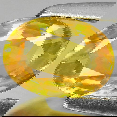 Yellow Natural Sapphire 1.09 Ct. VS Oval Shape 7.2 x 5.2 Mm. Gemstone From Madagascar: Product ID: 806160813 Product Name: Natural Yellow Sapphire Weight: 1.09 CT. Size: 7.2 x 5.2 x 3 MM. Shape: Oval Color: Yellow Clarity:VS Luster: Very Good Gems Origin: Madagascar Treatment: Heated Cr