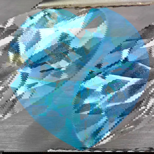 Natural Baby Blue Topaz 5.73 Ct. Heart Shape 11.2 Mm Gemstone From Brazil: Product ID: 807168755 Product Name: Natural Blue Topaz Weight: 5.73 CT. Size: 11.2 x 11.2 x 7 MM. Shape: Heart Shape Color: Baby Blue Clarity:VSI Luster: Good Gems Origin: Brazil Treatment: Treated Cr