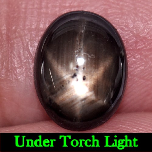 Natural Black Star Sapphire 3.00 Ct. Oval Cabochon Shape 9.8 x 7.6 Mm Gemstone from Thailand: Product ID: 806147653 Product Name: Natural Star Sapphire Weight: 3.00 CT. Size: 9.8 x 7.6 x 3.4 MM. Shape: Oval Cabochon Color: Black Clarity:Opaque Luster: Good 6 Rays Star Gems Origin: Thailand Tre