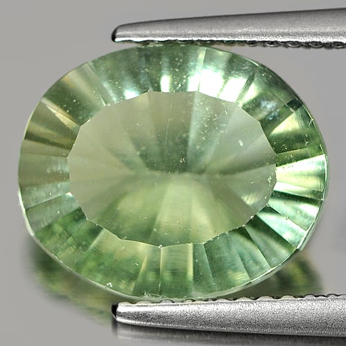 Natural Gemstone Green Fluorite 4.46 Ct. Oval Concave Cut 12 x 9.9 Mm. Unheated Gemstone From Brazil: Product ID: 802705290 Product Name: Natural Fluorite Weight: 4.46 CT. Size: 12 x 9.9 x 6.1 MM. Shape: Oval Concave Cut Color: Green Clarity:VSI Luster: Good Gems Origin: Brazil Treatment: Unheated Cry