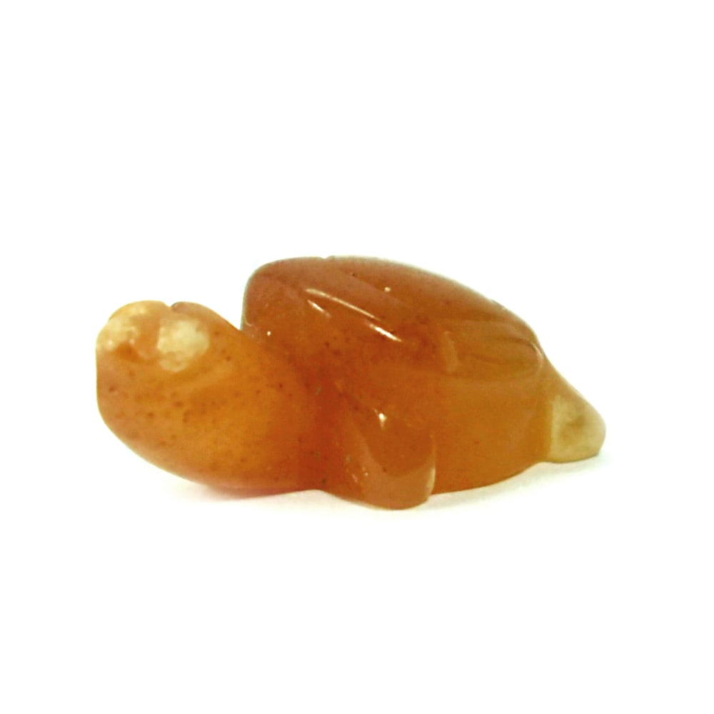 Natural Honey Jade 14.58 Ct. Turtle Carving Size 14 x 22 x 10 Mm. Gemstone: Product ID: 818102525 Product Name: Natural Gemstones Weight: 14.58 CT. Size: 14 x 22 x 10 MM. Shape: Caving Color: brown Honey Clarity:Opaque Luster: Good Gems Origin: Burma Treatment: Unheated Cryst