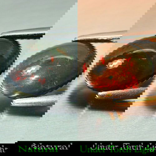 Natural Rainbow Fire Red Black Opal 1.39Ct. Oval Cabochon Shape 9.8 x 8 Mm. Gemstone: Product ID: 818724348 Product Name: Natural Opal Weight: 1.39 CT. Size: 9.8 x 8 x 4.8 MM. Shape: Oval Cabochon Color: Rainbow Fire Red Black Clarity:Semi - Transparent Luster: Iridescent Gems Origin: