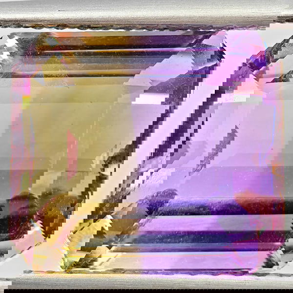 Natural Bi Color Ametrine 5.23 Ct. VVS Octagon Shape 10.5 x 9.3 Mm. Gemstone From Bolivia: Product ID: 800408609 Product Name: Natural Ametrine Weight: 5.23 CT. Size: 10.5 x 9.3 x 7 MM. Shape: Octagon Color: Bi Color Clarity:VVS Luster: Good Gems Origin: Bolivia Treatment: Unheated Crystal