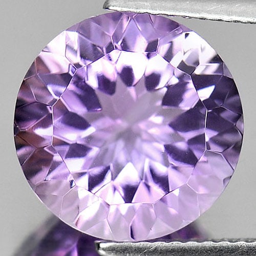 Natural Purple Amethyst 6.07 Ct. Clean Round Cornflower Cut 12 Mm. Unheated Gemstone From Brazil: Product ID: 800324869 Product Name: Natural Amethyst Weight: 6.07 CT. Size: 12 x 12 x 8 MM. Shape: Round Cornflower Cut Color: Purple Clarity:IF Luster: Very Good Gems Origin: Brazil Treatment: Unheat