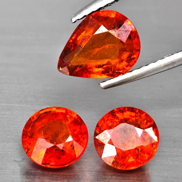 Natural Orangish Red Spessartine Garnet 5.07 Ct. 3 Pcs Mixed Shape Gemstones From Namibia: Product ID: 802937930 Product Name: Natural Garnet Weight: 5.07 CT. Size: 9 x 6.9 x 3.9 to 6.6 x 6.6 x 4.6 MM. Shape: Mixed Shape Color: Orangish Red Clarity:SI1 Luster: Good Gems Origin: Namibia Trea