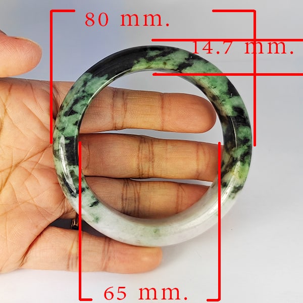 Natural Genuine Mutil Color Jade 451.74 Ct. Bangle Round Diameter 80 x 65 Mm Gemstone from Thailand: Product ID: 819816156 Product Name: Natural Gemstones Weight: 451.74 CT. Size: 80 x 65 x 14.7 MM. Shape: Round Color: Multi-Color Green Clarity:Opaque Luster: Good Gems Origin: Thailand Treatment: Unh