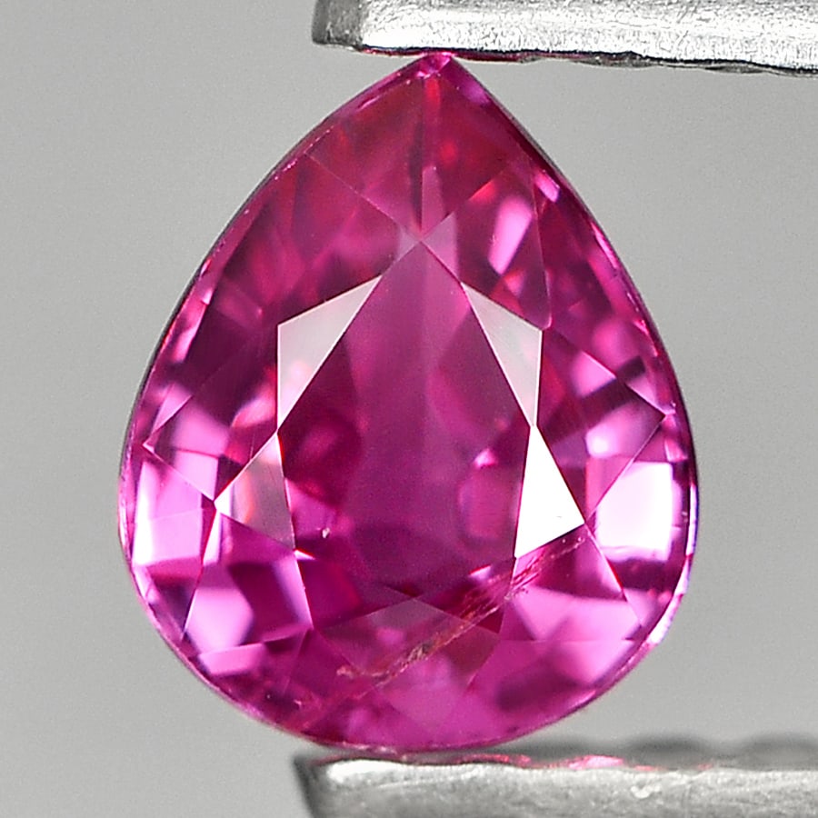 Natural Purplish Pink Ruby 0.46 Ct. Pear Shape 5 x 4.2 Mm Gemstone from Madagascar: Product ID: 805921522 Product Name: Natural Ruby Weight: 0.46 CT. Size: 5 x 4.2 x 2.6 MM. Shape: Pear Color: Purplish Pink Clarity:VSI Luster: Very Good Gems Origin: Madagascar Treatment: Unheated Cry