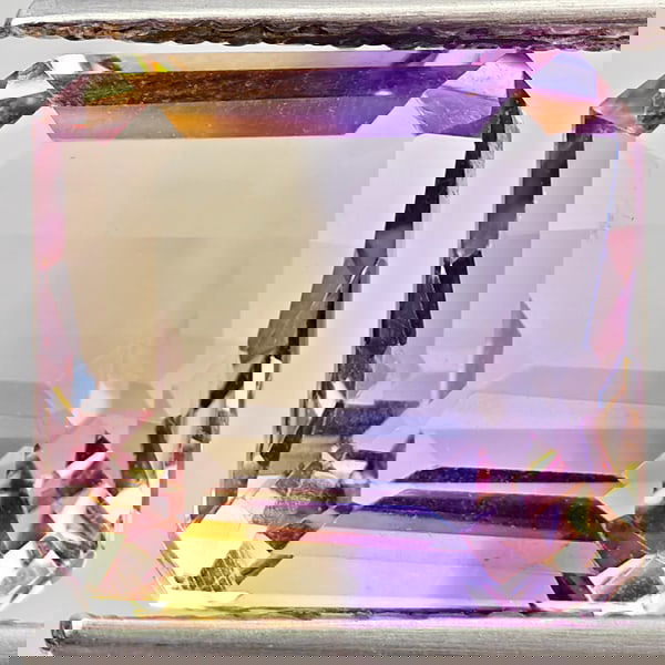 Natural Bi Color Ametrine 4.07 Ct. Octagon Shape 9.3 x 9 Mm. Gemstone From Bolivia: Product ID: 800408628 Product Name: Natural Ametrine Weight: 4.07 CT. Size: 9.3 x 9 x 6.2 MM. Shape: Octagon Color: Bi Color Clarity:VSI Luster: Good Gems Origin: Bolivia Treatment: Unheated Crystal S