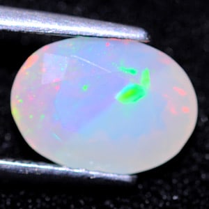 Natural Multi Color Opal 1.49 Ct. Oval Shape 9.8 x 7.3 Mm. Unheated Gemstone From Sudan (1 of 3)