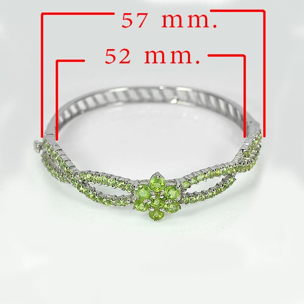 Natural Green Peridot with 925 Sterling Silver Bangle Jewelry Diameter 52 Mm. 12.22 Grams: Product ID: 201100142 Product Name: Sterling Silver Bangle Product Type: 925 Sterling Silver Fine Jewelry Jewelry Weight: 12.22 Grams. Gemstones Color: Green Metal: Solid Silver 92.5%. Gemstone Detail