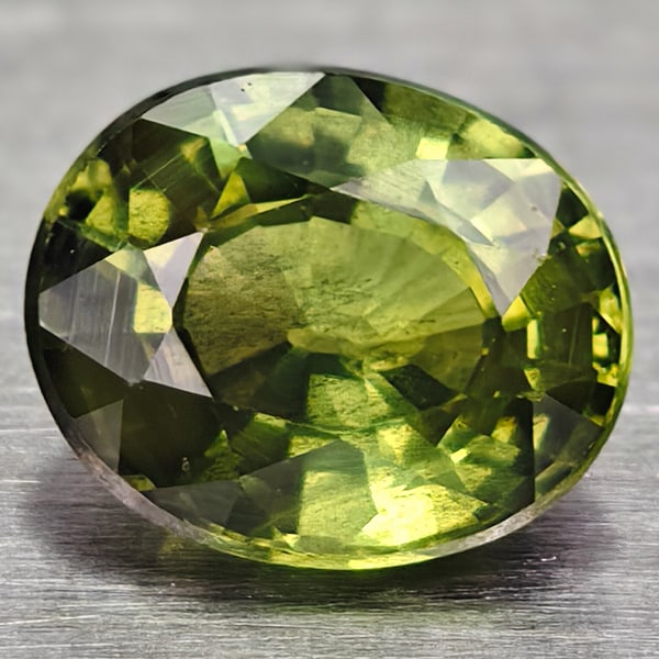 Natural Green Sapphire 0.59 Ct. Oval Shape 5.3 x 4.4 Mm Gemstone from Thailand (1 of 3)