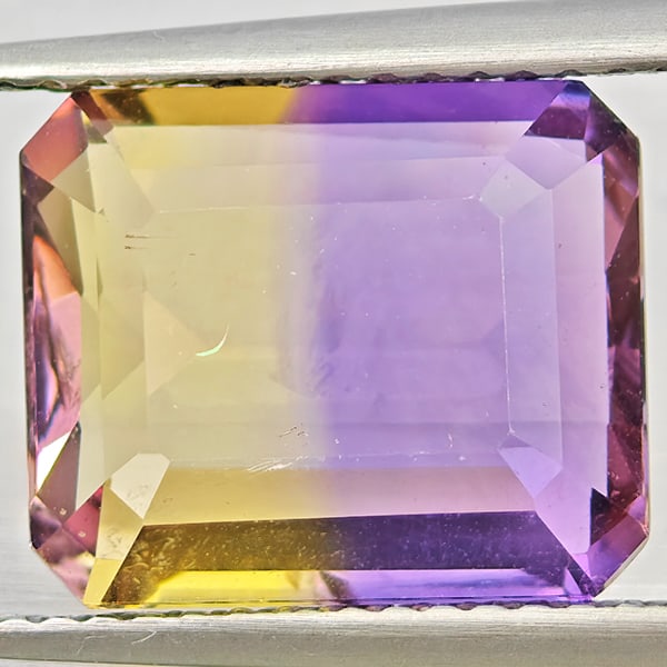 Natural Bi Color Ametrine 4.04 Ct. Octagon Shape 11.4 x 8.6 Mm Gemstone: Product ID: 800408618 Product Name: Natural Ametrine Weight: 4.04 CT. Size: 11.4 x 8.6 x 5.4 MM. Shape: Octagon Color: Bi Color Clarity:VVS Luster: Good Gems Origin: Bolivia Treatment: Unheated Crysta
