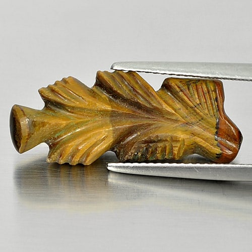Natural Tiger Eye 9.21 Ct. Carving Leaves 25 x 12.2 Mm. Gemstone From Thailand: Product ID: 811600093 Product Name: Natural Tiger eye Weight: 9.21 CT. Size: 25 x 12.2 x 5.8 MM. Shape: Carving Leaves Color: Golden Clarity:Opaque Luster: Good Gems Origin: Thailand Treatment: Unheat