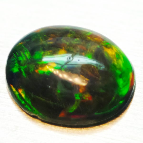 Natural Multi-Color Opal 1.05 Ct. Oval Cabochon Shape 8 x 6.4 Mm. Gemstone (1 of 3)
