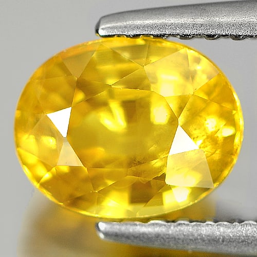 Natural Yellow Sapphire 1.73 Ct. Oval Shape 7.5 x 6 Mm. Gemstone From Thailand: Product ID: 806139066 Product Name: Natural Yellow Sapphire Weight: 1.73 CT. Size: 7.5 x 6 x 4.3 MM. Shape: Oval Color: Yellow Clarity:SI Luster: Very Good Gems Origin: Thailand Treatment: Heated Crys