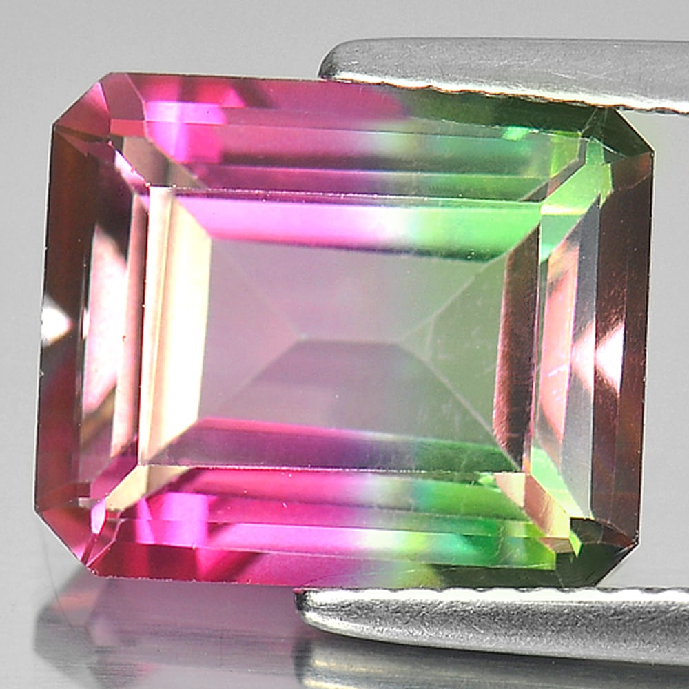 Natural Emerald Envy Pure Pink Topaz 7.26 Ct. VVS Octagon Shape 12 x 10 Mm. Gemstone From Brazil: Product ID: 807166476 Product Name: Natural Topaz Weight: 7.26 CT. Size: 12 x 10 x 6.3 MM. Shape: Octagon Color: Bi-Color Clarity:VVS Luster: Good Gems Origin: Brazil Treatment: Treated Crystal Struct
