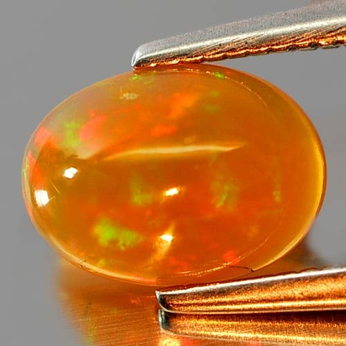 Natural Multi Color Opal 0.67 Ct. Oval Cabochon Shape 8.1 x 5.9 Mm. Unheated Gemstone (1 of 3)