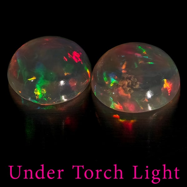 Natural Multi Color Opal 1.40 Ct. 2 Pcs. Round Cabochon Shape 7.3 Mm. Gemstones: Product ID: 818728262 Product Name: Natural Opal Weight: 1.40 CT. Size: 7.3 x 7.3 x 3 MM. Shape: Round Cabochon Color: Multi-Color Clarity:Semi - Transparent Luster: Good Gems Origin: Ethiopia Treatme