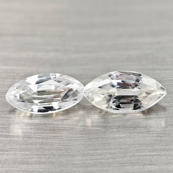 Natural White Color Zircon 1.40 Ct. 2 Pcs. Marquise Shape 7.1 x 3.7 Mm Gemstone from Cambodia: Product ID: 807742940 Product Name: Natural Zircon Weight: 1.40 CT. Size: 7.1 x 3.7 x 2.6 MM. Shape: Marquise Color: White Clarity:VSI Luster: Good Gems Origin: Cambodia Treatment: Heated Crystal Stru