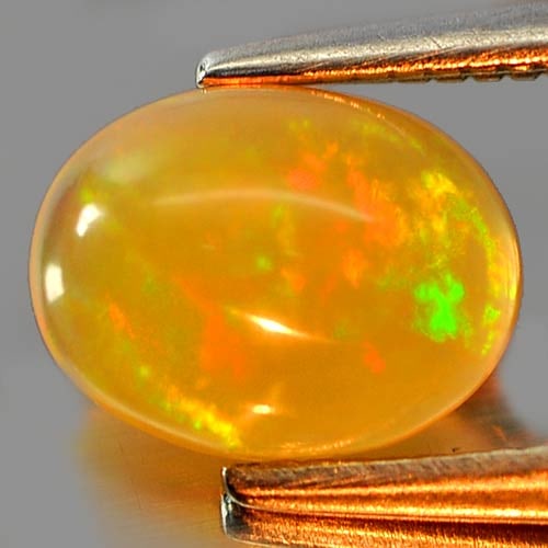 Natural Multi Color Opal 0.75 Ct. Oval Cabochon Shape 8 x 6.2 Mm. Gemstone (1 of 3)