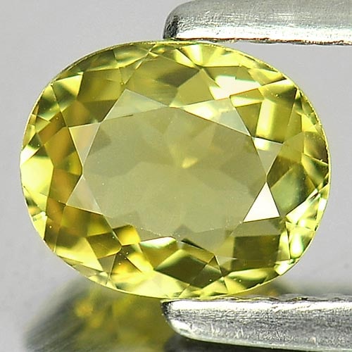 Natural Greenish Yellow Tourmaline 0.83 Ct. Oval Shape 6.6 x 5.5 Mm Gemstone from Nigeria: Product ID: 807246376 Product Name: Natural Tourmaline Weight: 0.83 CT. Size: 6.6 x 5.5 x 3.3 MM. Shape: Oval Color: Greenish Yellow Clarity:VVS Luster: Good Gems Origin: Nigeria Treatment: Unheated C