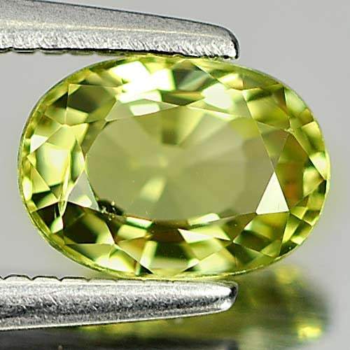 Natural Yellowish Green Tourmaline 0.78 Ct. Oval Shape 6.8 x 4.9 Mm Gemstone from Nigeria (1 of 3)