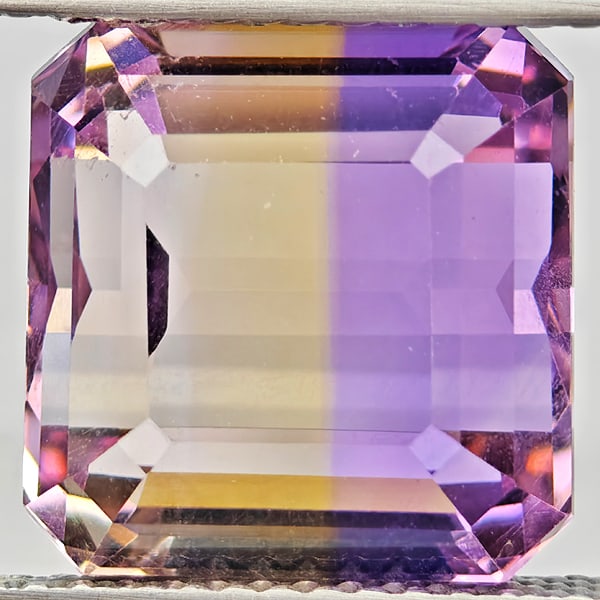 Natural Bi Color Ametrine 6.66 Ct. VVS Octagon Shape 10.7 x 10.5 Mm. Gemstone From Bolivia: Product ID: 800408597 Product Name: Natural Ametrine Weight: 6.66 CT. Size: 10.7 x 10.5 x 7.5 MM. Shape: Octagon Color: Bi Color Clarity:VVS Luster: Good Gems Origin: Bolivia Treatment: Unheated Cryst