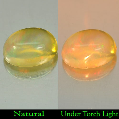 Natural Multi Color Opal 1.66 Ct. Oval Cabochon Shape 9.2 x 6.7 Mm Gemstone from Ethiopia: Product ID: 818710136 Product Name: Natural Opal Weight: 1.66 CT. Size: 9.2 x 6.7 x 5 MM. Shape: Oval Cabochon Color: Multi Color Clarity:Semi - Transparent Luster: Good Gems Origin: Ethiopia Treatmen