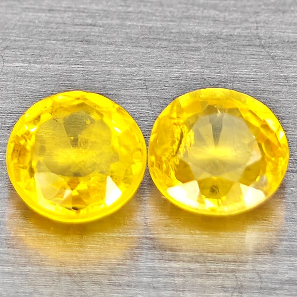 Natural Yellow Sapphire 0.64 Ct. 2 Pcs Round Shape 3.9 Mm Gemstones From Thailand: Product ID: 806162926 Product Name: Natural Yellow Sapphire Weight: 0.64 CT. Size: 3.9 x 3.9 x 2.1 MM. Shape: Round Shape Color: Yellow Clarity:VSI Luster: Good Gems Origin: Thailand Treatment: Heated