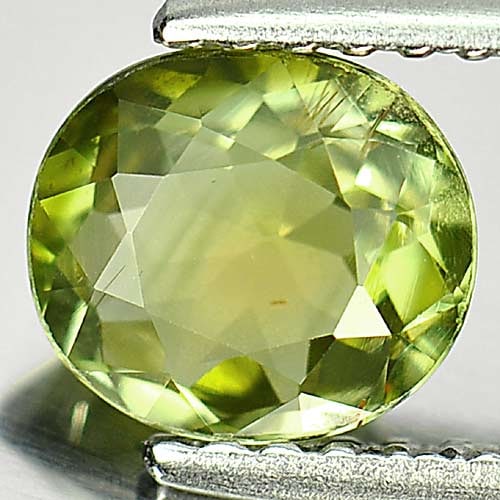 Natural Yellowish Green Tourmaline 0.91 Ct. Oval Shape 6.5 x 5.8 Mm Gemstone from Nigeria: Product ID: 807246338 Product Name: Natural Tourmaline Weight: 0.91 CT. Size: 6.5 x 5.8 x 3.5 MM. Shape: Oval Color: Green Clarity:VSI Luster: Good Gems Origin: Nigeria Treatment: Unheated Crystal Str