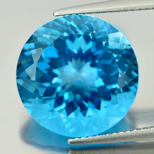 Natural Swiss Blue Topaz 11.58 Ct. Beautiful Round Cornflower Cut 15.1 Mm Gemstone From Brazil: Product ID: 807166747 Product Name: Natural Blue Topaz Weight: 11.58 CT. Size: 15.1 x 15.1 x 9.5 MM. Shape: Round Cornflower Cut Color: Blue Clarity:IF Luster: Good Gems Origin: Brazil Treatment: Trea