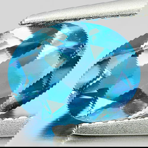 Natural London Blue Topaz 2.09 Ct. Oval Shape 9 x 7 Mm Gemstone from Brazil: Product ID: 807160802 Product Name: Natural Blue Topaz Weight: 2.09 CT. Size: 9 x 7 x 4.2 MM. Shape: Oval Color: London Blue Clarity:VVS Luster: Good Gems Origin: Brazil Treatment: Treated Crystal Str
