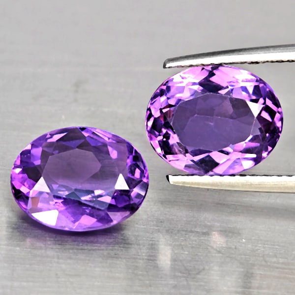Natural Purple Amethyst 6.14 Ct. 2 Pcs Oval Shape 11.2 x 9.2 Mm Gemstone From Brazil: Product ID: 800325654 Product Name: Natural Amethyst Weight: 6.14 CT. Size: 11.2 x 9.2 x 5.8 MM. Shape: Oval Shape Color: Purple Clarity:VSI Luster: Good Gems Origin: Brazil Treatment: Unheated Crysta