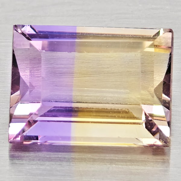 Natural Bi Color Ametrine 1.70 Ct. Baguette Shape 8.2 x 6.1 Mm Gemstone From Bolivia: Product ID: 800408473 Product Name: Natural Ametrine Weight: 1.70 CT. Size: 8.2 x 6.1 x 4.3 MM. Shape: Baguette Color: Bi Color Clarity:VSI - SI1 Luster: Good Gems Origin: Bolivia Treatment: Unheated 