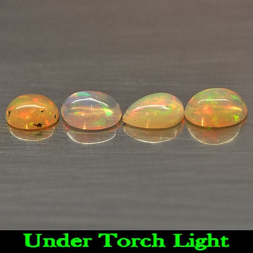 Natural Multi-Color Opal 1.06 Ct. 4 Pcs. Cabochon Mix Shap Unheated Gemstone: Product ID: 818723042 Product Name: Natural Opal Weight: 1.06 CT. Size: 5 x 4 x 2.3 MM. Shape: Mix Shap Cabochon Color: Multi Color Clarity:Semi - Transparent Luster: Strong Iridescent Gems Origin: Et