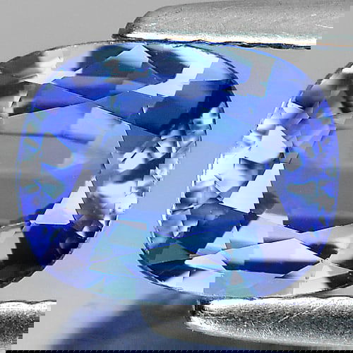 Natural Violetish Blue Tanzanite 1.48 Ct. Clean Cushion Shape 7.93 x 6.48 Mm. Gemstone From Tanzania: Product ID: 807004091 Product Name: Natural Tanzanite Weight: 1.48 CT. Size: 7.93 x 6.48 x 3.66 MM. Shape: Cushion Color: Blue Clarity:IF Luster: Very Good Gems Origin: Tanzania Treatment: Heated Crys