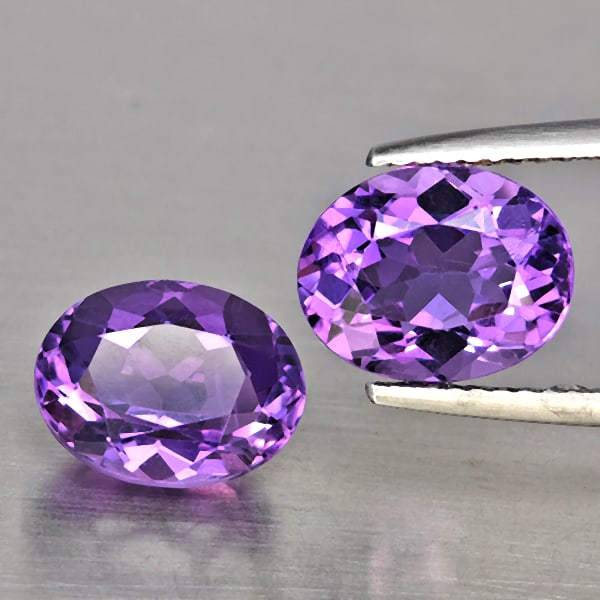 Natural Purple Amethyst 7.55 Ct. 2 Pcs Oval Shape 11.2 x 9 Mm Gemstone From Brazil: Product ID: 800325661 Product Name: Natural Amethyst Weight: 7.55 CT. Size: 11.2 x 9 x 6.9 MM. Shape: Oval Shape Color: Purple Clarity:VSI Luster: Good Gems Origin: Brazil Treatment: Unheated Crystal