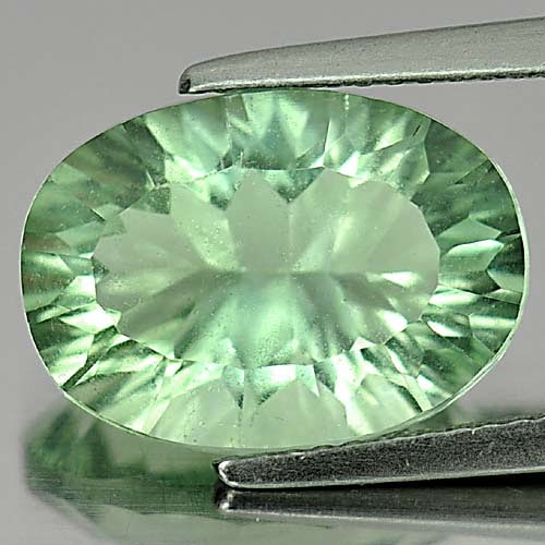 Natural Green Fluorite 7.42 Ct. Oval Concave Cut 14.3 x 10.3 Mm. Gemstone from Brazil (1 of 3)
