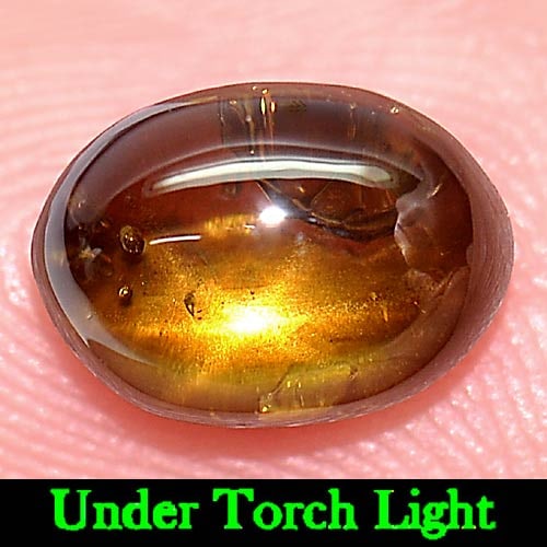 Natural Golden Star Sapphire 2.59 Ct. Oval Cabochon Shape 8.2 x 6 Mm Gemstone from Thailand: Product ID: 806158158 Product Name: Natural Star Sapphire Weight: 2.59 CT. Size: 8.2 x 6 x 4.5 MM. Shape: Oval Cabochon Color: Yellow Clarity:Opaque Luster: Good 6 Rays Star Gems Origin: Thailand Trea