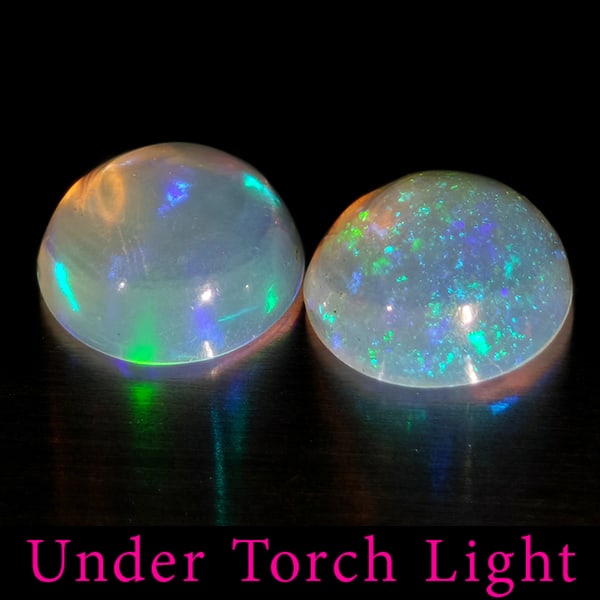 Natural Multi Color Opal 1.35 Ct. 2 Pcs Round Cabochon Shape 6.7 Mm Gemstones from Ethiopia: Product ID: 818728254 Product Name: Natural Opal Weight: 1.35 CT. Size: 6.7 x 6.7 x 3.2 MM. Shape: Round Cabochon Color: Multi-Color Clarity:Semi - Transparent Luster: Good Gems Origin: Ethiopia Treat