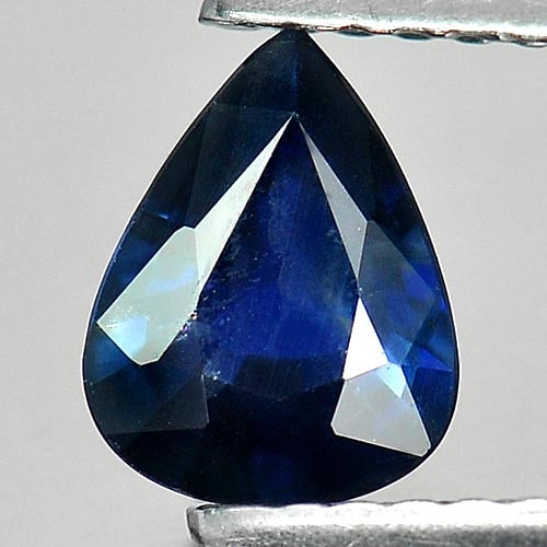 Natural Blue Sapphire 0.78 Ct. Pear Shape 7 x 5.5 Mm. Gemstone From Thailand: Product ID: 806008681 Product Name: Natural Blue Sapphire Weight: 0.78 CT. Size: 7 x 5.5 x 2.9 MM. Shape: Pear Color: Blue Clarity:SI Luster: Good Gems Origin: Thailand Treatment: Heated Crystal Struc